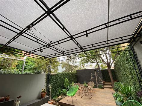 retractable fabric awnings     solution   outdoor entertainment area