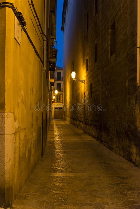 narrow street  palma de mallorca  night stock photo image  mediterranean falling