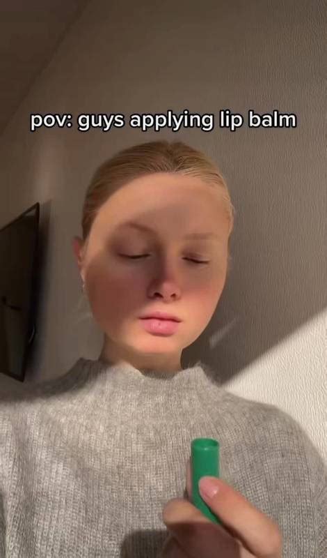 Girl Is Showing How Men Apply Lip Balm