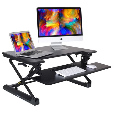 mllieroo adjustable  standing desk dual monitor riser spring stand converter desk computer