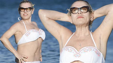 Tina Malone Proudly Shows Off Her Bikini Body As She Cools Off In The