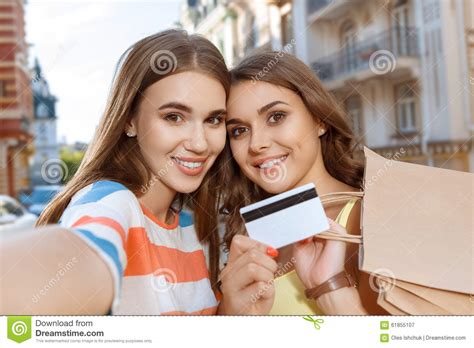 Two Friends Doing Selfie With Shopping Bags Stock Image