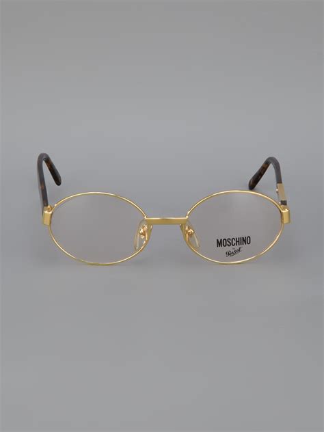 Moschino Round Frame Glasses In Metallic Lyst