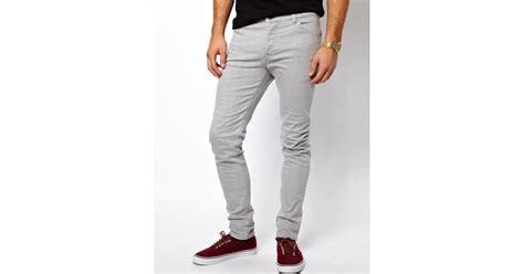 asos skinny jeans in mid grey in gray for men lyst