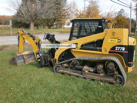 caterpillar  cat track skid steer loader backhoe attachment