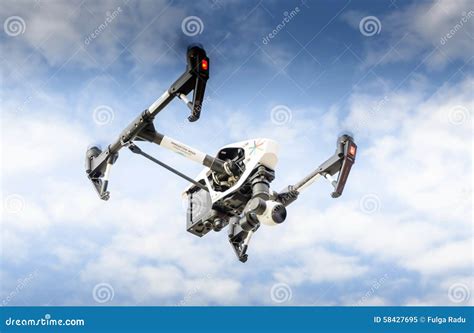 drone  surveillance camera flying   sky cloud editorial image image  growing