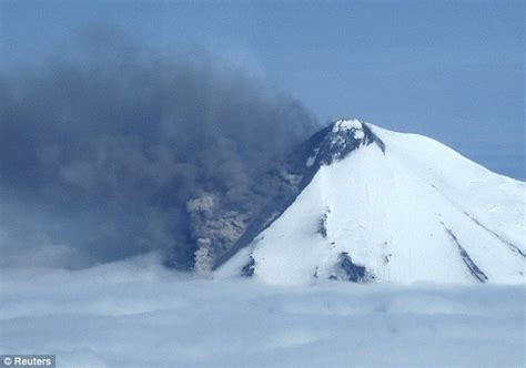 erupting alaska volcano prompts scientists to issue first red alert