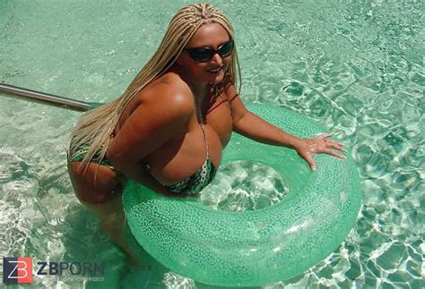 bb demonstrates her gunns at the pool zb porn