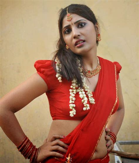 sexy reshmi aunty hot in red saree pallu drop big boobs cleavage deep