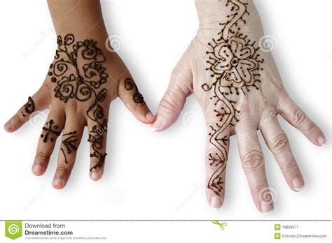 Duas Mãos Fêmeas Com Tatuagens Do Henna Imagem De Stock