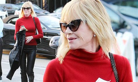 melanie griffith rocks form fitting leather trousers and bright red top daily mail online