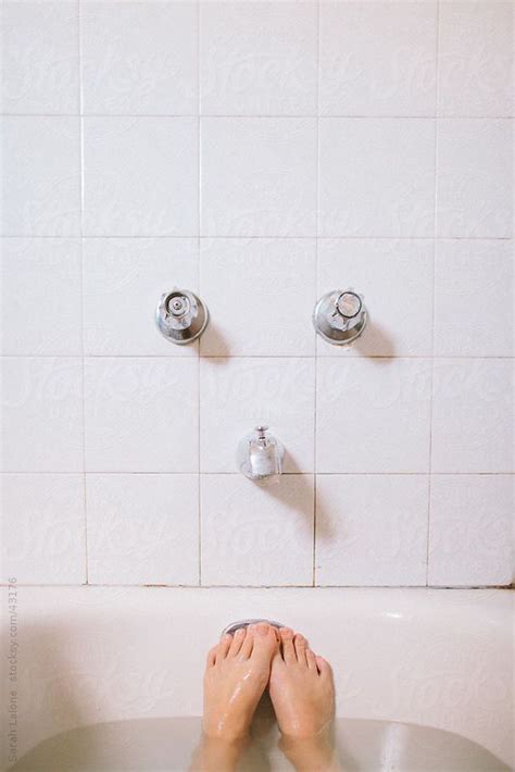 A Womans Feet In A Bathtub With Tile And Faucet By Sarah Lalone Film