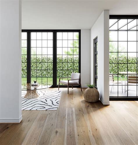 designing  lighter toned wide plank wood flooring