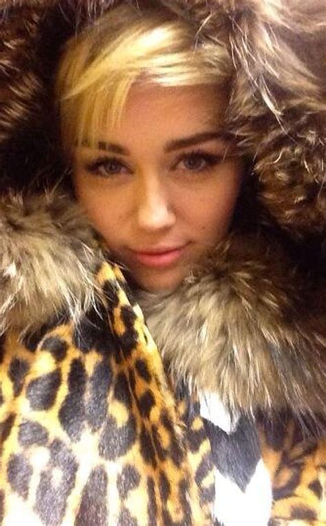 Miley Cyrus Is Naked No More See Her Bundled Up Snow Bunny Look E