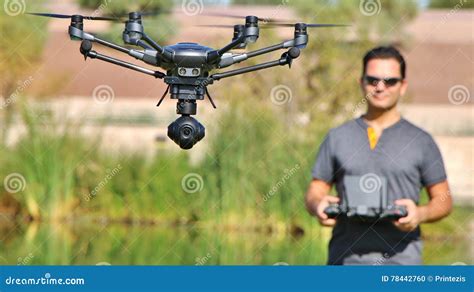 man flying  camera drone uas wide screen large file stock photo image  control