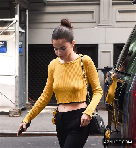 Selena Gomez Braless In Yellow Sweater In New York City Aznude