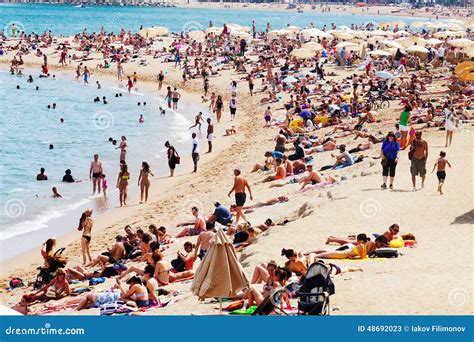 people sunbathing  mediterranean beach editorial stock photo image  sand barceloneta