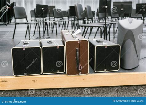 musical instruments   cases waiting   disbursed stock image