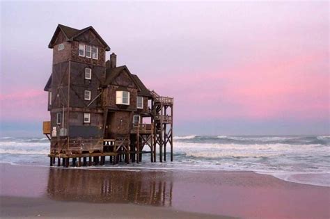 abandoned beach house   outer banks north carolina slowly  reclaimed   sea