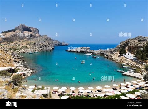 St Pauls Bay Beach With The Acropolis Behind Lindos Rhodes Greece
