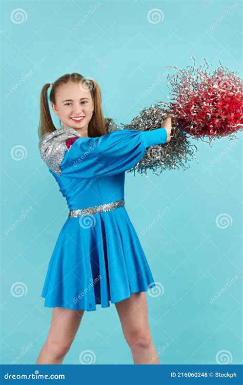 Portrait Of Young Cheerleader Girl From Cheerleading Group Turquoise