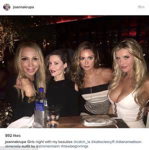 joanna krupa shows off cleavage while enjoying night out