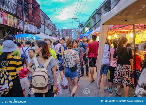 Unacquainted Tourists Walking In Chiang Mai Night Market Walking Street
