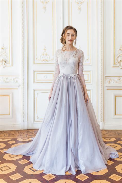 lavender wedding gown  sheer sleeves  floral appliques floating