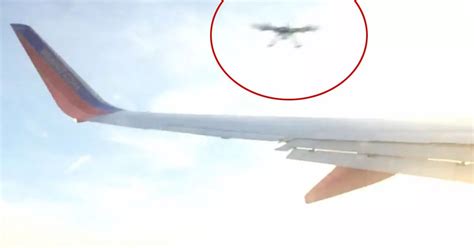 drones smashes  planes wing  terrifying footage       mirror