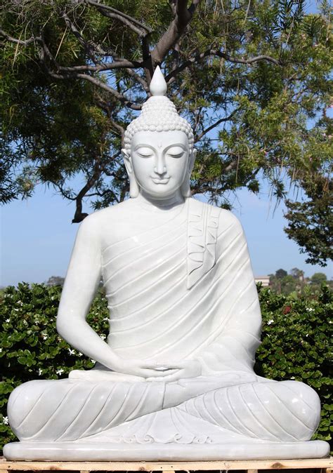 large marble meditating buddha garden statue  serene smile  flame finial  wm