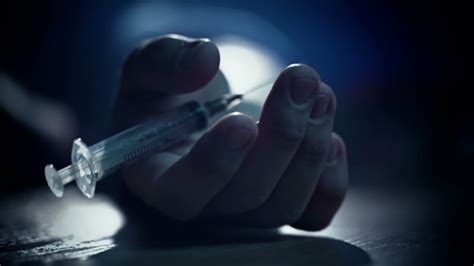 junkie hand  syringe pricked heroin drugs  callstock