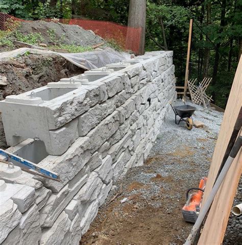 installation  interlocking retaining wall blocks  ridge industries