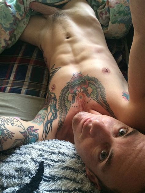 horny tattooed fella shows his penis nude men with boners