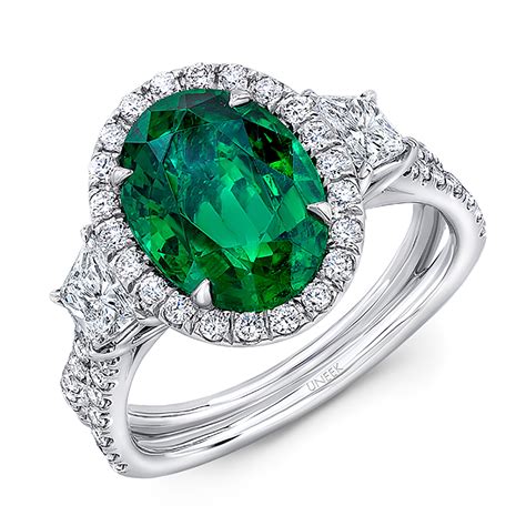 uneek three stone ring with oval green emerald center and