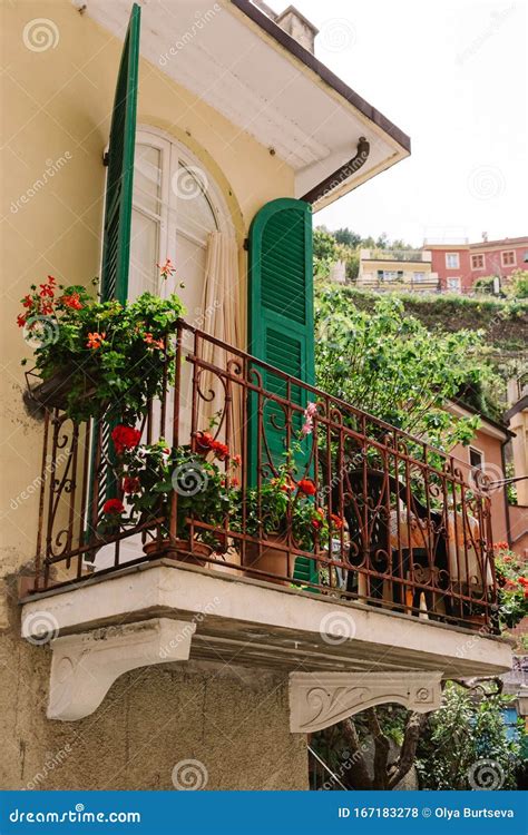 residential  house  italy stylish balcony   italian house  potted flowers stock