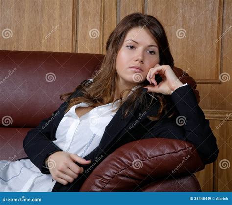 the thoughtful girl in suit on a r sofa stock image image of