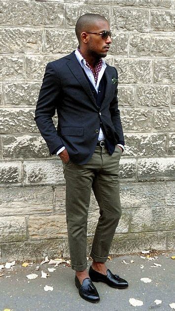 wear a dark blue coat and olive trousers for your nine to five a pair of black… loafers men