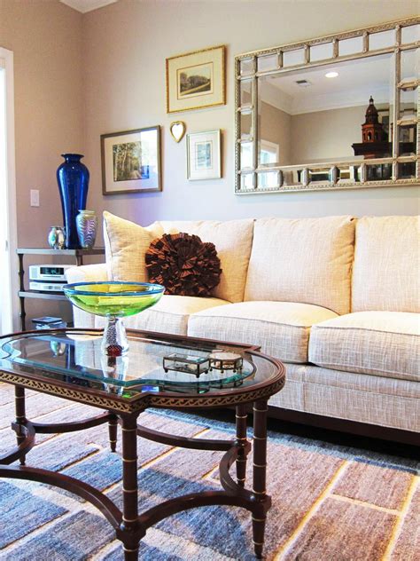 transitional living room  cream couch hgtv