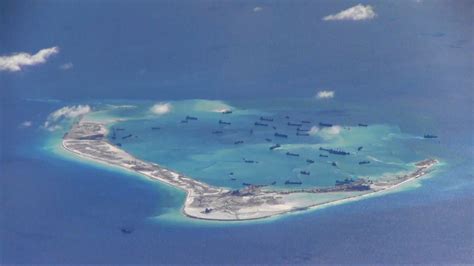 risks provoking  militarization  south china sea