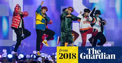 bts korean band s managers apologise over nazi photos bts the guardian