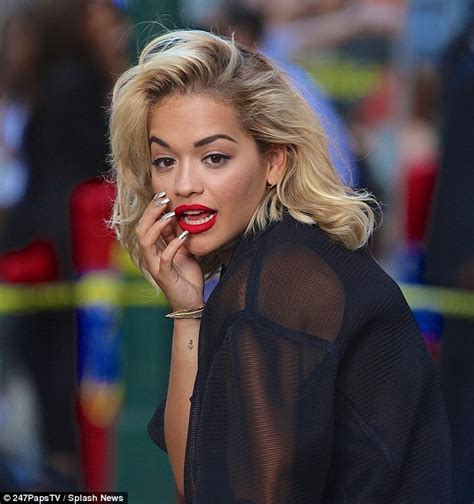 picking up interesting fashion tips rita ora returns to her hotel in pvc skirt with her pants