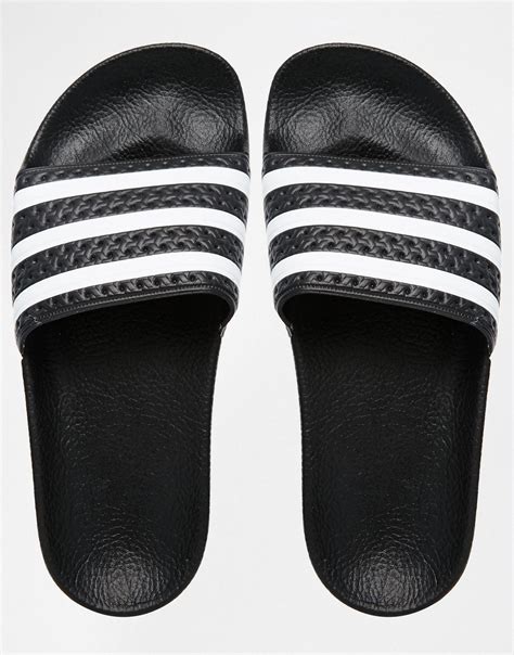 adidas originals originals adilette black white stripe slider sandals black lyst