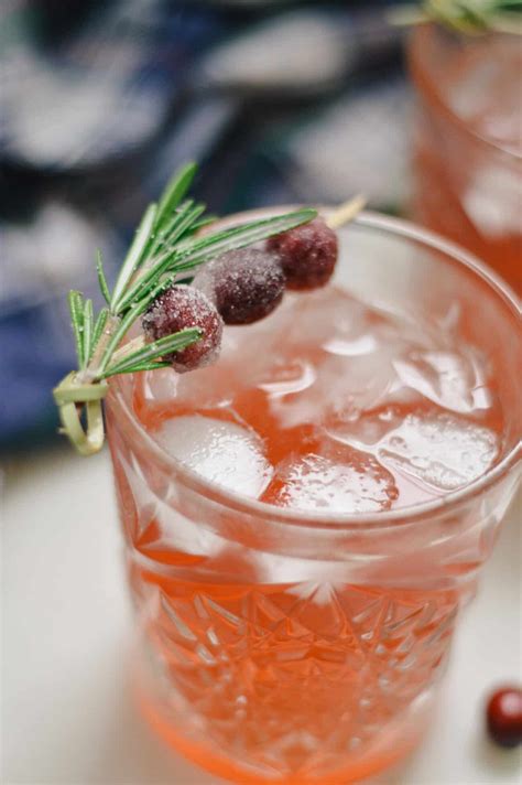 cranberry cocktail recipe with bourbon rosemary an unblurred lady