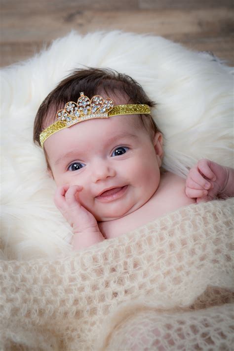cute smile   newborn baby girl   st portrait