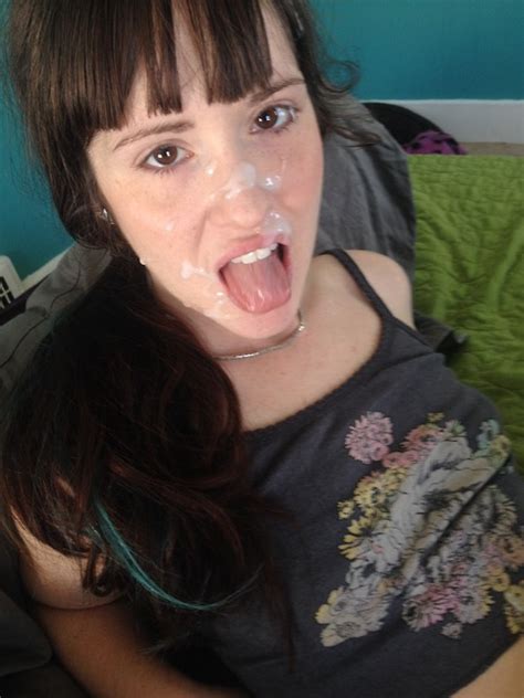 beautiful brown eyed brunette amateur with a nice cum splattering on her face gorgeous