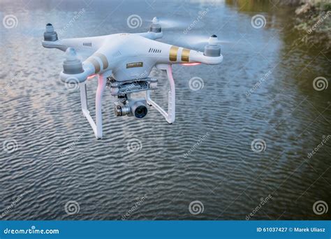 phantom quadcopter drone flying  water editorial photography image  camera radio