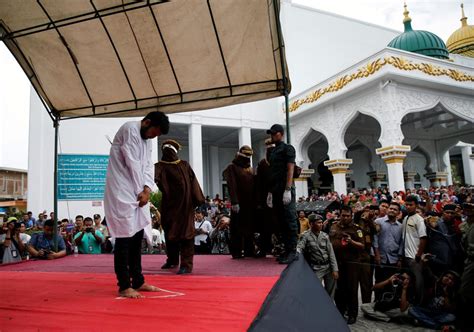 two men publicly caned in indonesia for having gay sex world news hindustan times