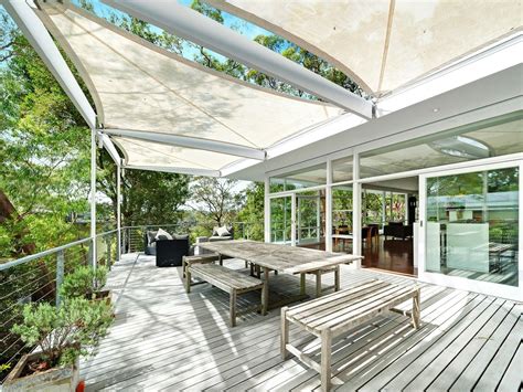 pin  sarah heasman  deck outdoor decor cove modernist