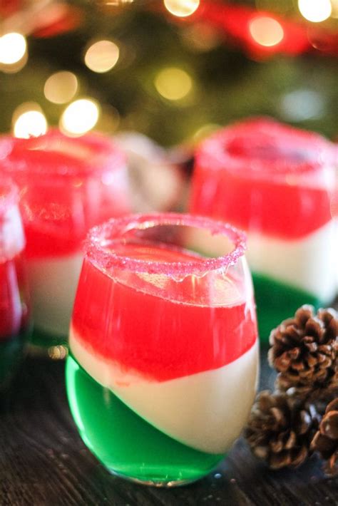 these christmas jello cups are a boozy holiday treat with layers of