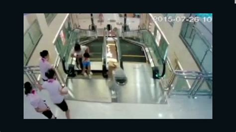 man watches wife die in china escalator accident cnn video